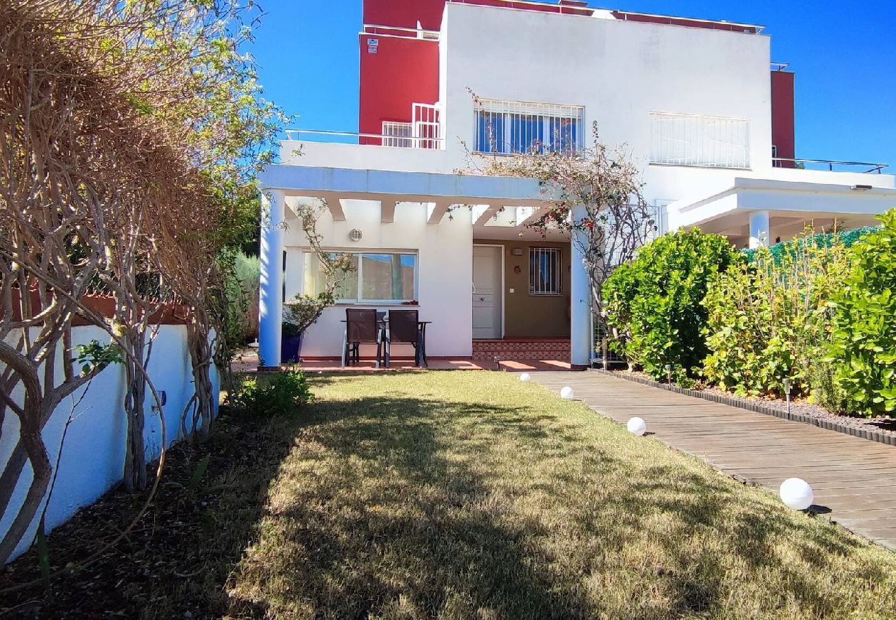 Maison mitoyenne à Peñiscola - Villa avec jardin commun et piscine 